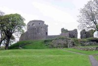 Dundrum Castle:  The castle was captured by King John in 1210 and and returned to Hugh de Lacy when he regained his Earldom in 1226.The Maginnis family seized Dundrum in the late fourteenth century and held it intermittently until expelled by Lord Mountjoy in 1601. It was made over to Lord Cromwell in 1605 and sold to Sir Francis Blundell in 1636. The Maginnis family retrieved it in 1642, but later lost it to the Parliamentarians, who dismantled it in 1652.After 1660 the Blundells returned and built a gabled L-shaped mansion in the south-west corner of the outer bailey. This dwelling was ruined by the time the property passed to the second Marquess of Downshire in the early nineteenth century. The castle and grounds were placed in State Care by the seventh Marquess in 1954. Photo Pat Devlin CLICK FOR LARGER PICTURE